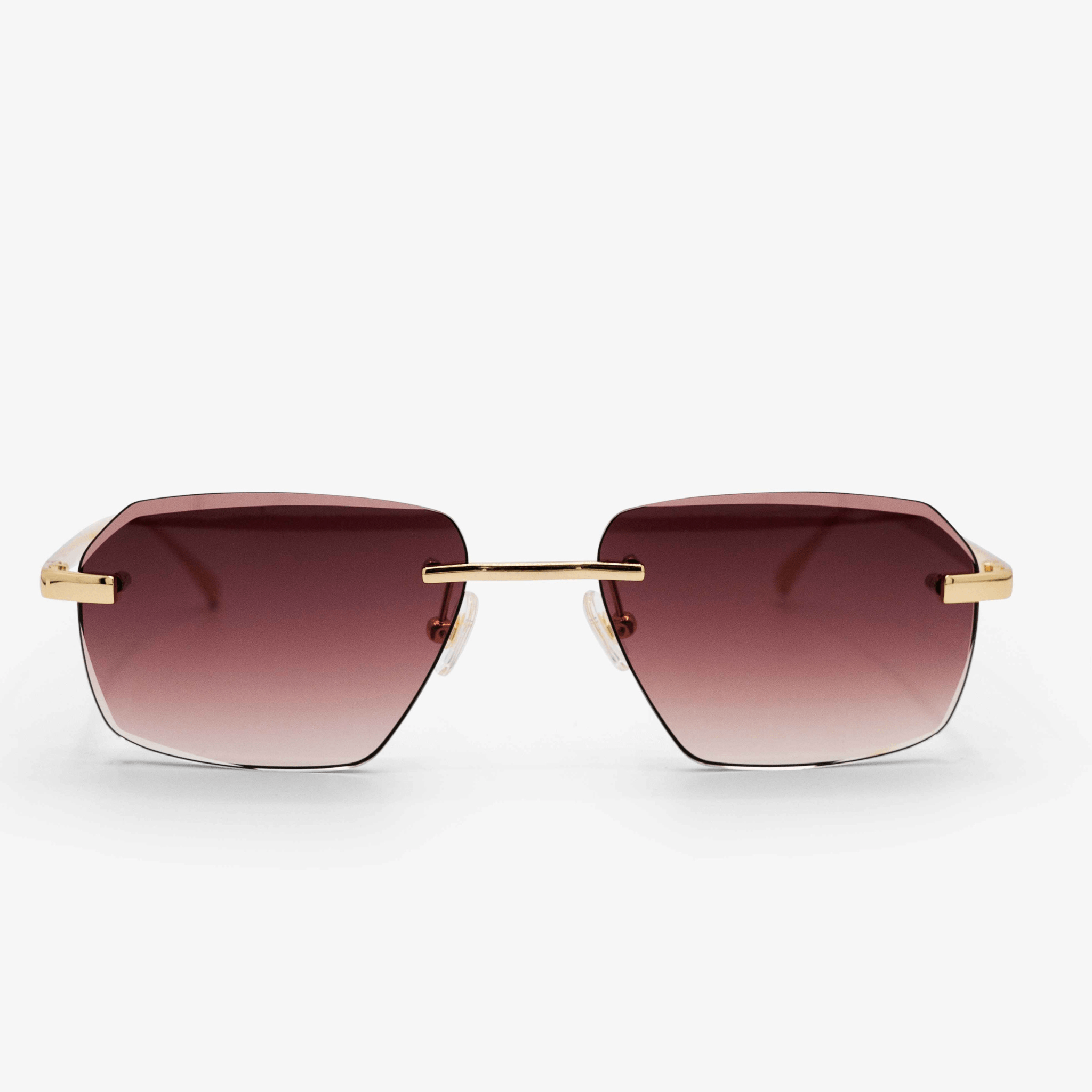 Model Sancy modern sunglasses featuring a brown gradient diamond-cut design with rimless lenses and 18K gold accents on the arms and bridge, set against a white backdrop.